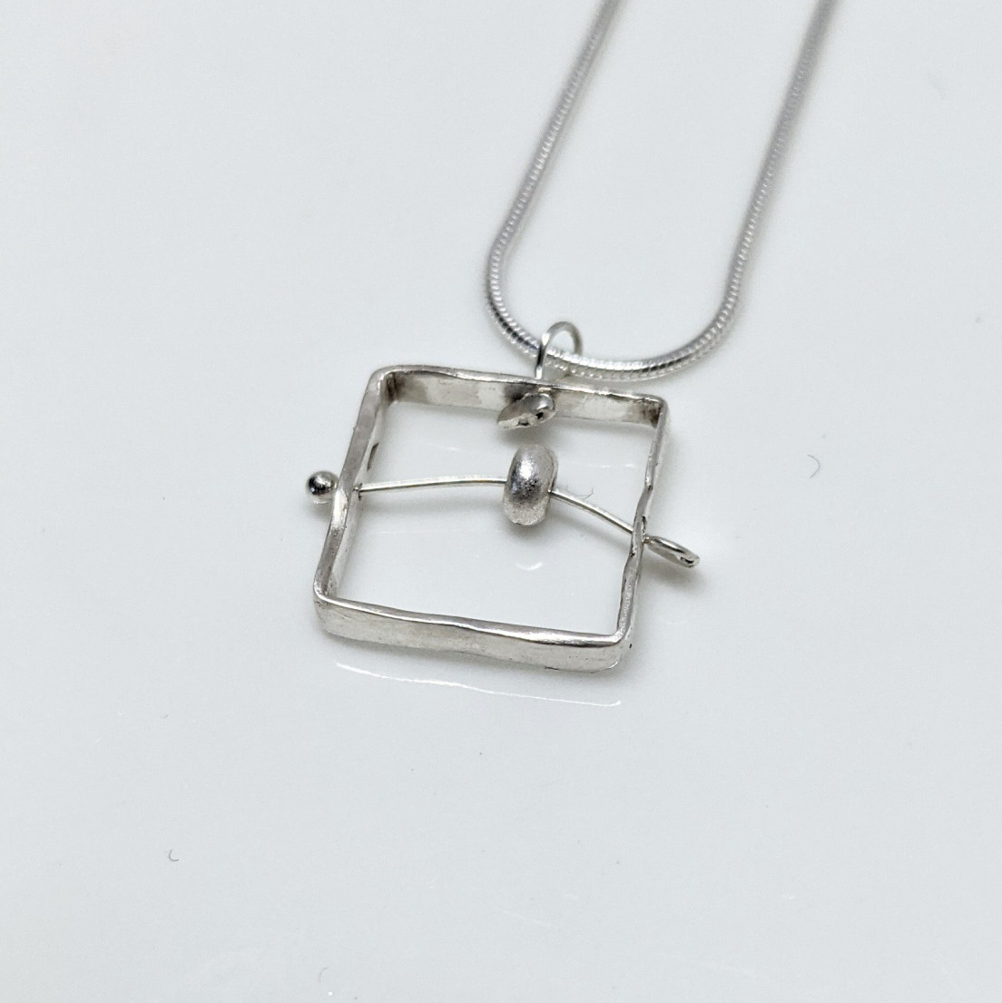 Pendentif equilibrado