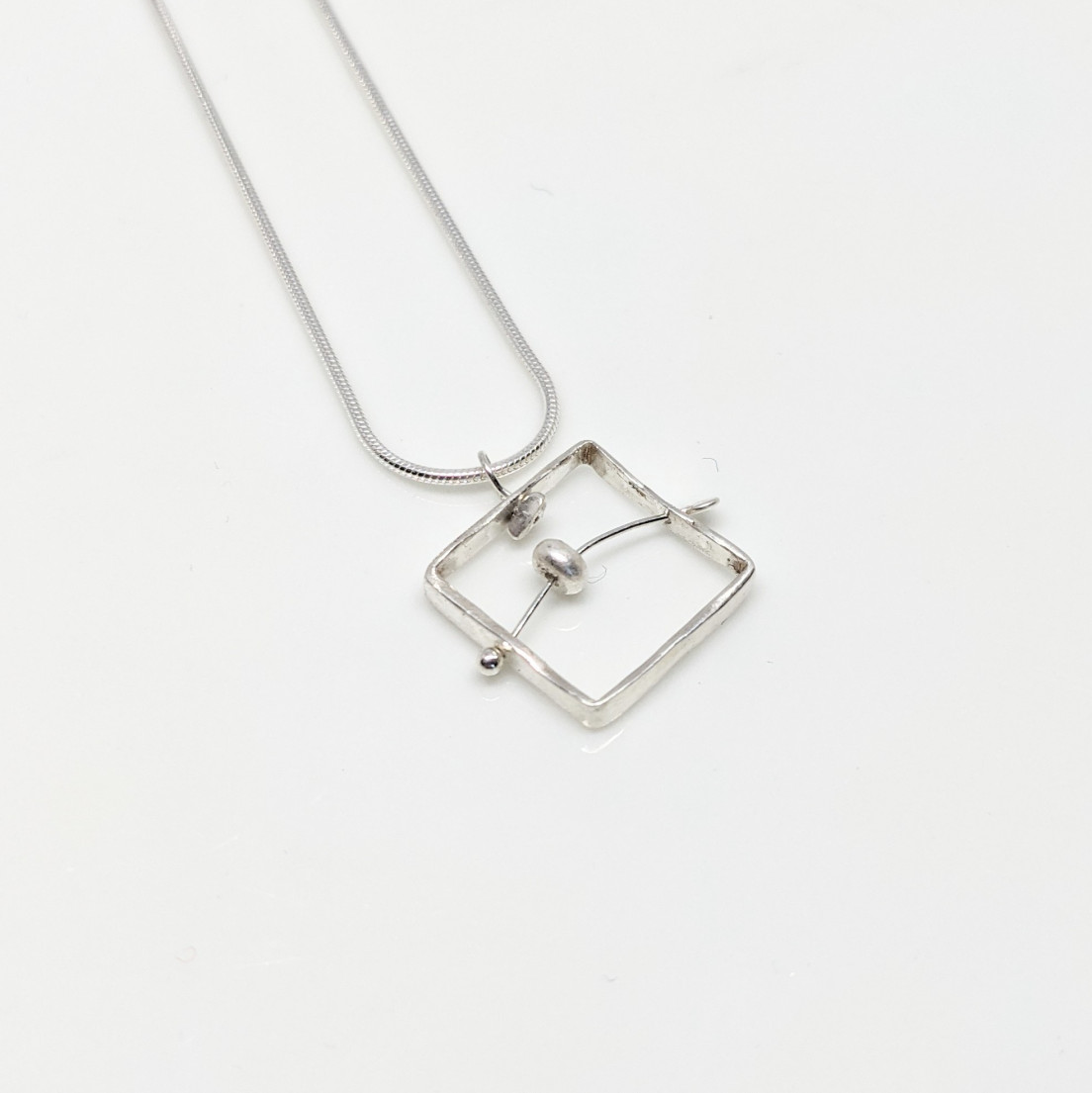 Pendentif equilibrado